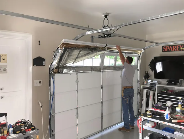 Garage door section replacement by East Hampton Garage Door Repair in East Hampton