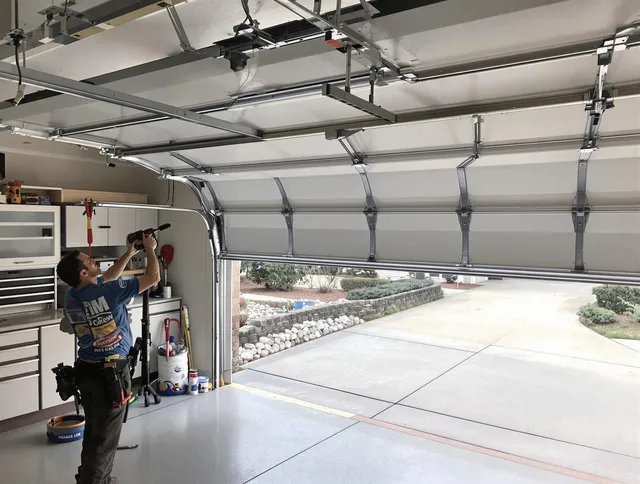 Garage door track repair service by East Hampton Garage Door Repair in East Hampton